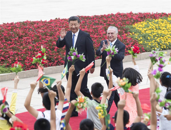 Chinese President Xi Jinping (L) holds a welcome ceremony for Brazilian President Michel Temer before their talks in Beijing, capital of China, Sept. 1, 2017. Temer is in China for a state visit at the invitation of Xi. During his stay, Temer will also attend the BRICS summit and the Dialogue of Emerging Markets and Developing Countries to be held in China's southeastern coastal city of Xiamen in Fujian Province from Sept. 3 to 5. (Xinhua/Wang Ye) 
