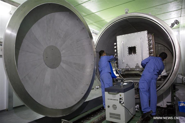 Engineers debug a neutron instrument for the China Spallation Neutron Source (CSNS) in Dongguan, south China's Guangdong Province, Sept. 1, 2017. According to a press conference held by the Institute of High Energy Physics of Chinese Academy of Sciences in Dongguan Friday, a neutron beam was successfully obtained at the CSNS for the first time on Aug. 28, 2017, which marks the completion of the main construction and the start of the test operation phase for the CSNS project, a national large scientific facility. The project should be fully completed and open to domestic and overseas users by 2018 as scheduled. (Xinhua/Jin Liwang)