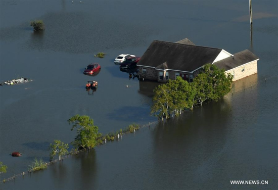 Aerial photo taken on Sept. 1, 2017 shows flooded houses after Hurricane Harvey attacked Houston, Texas, the United States. (Xinhua/Yin Bogu)