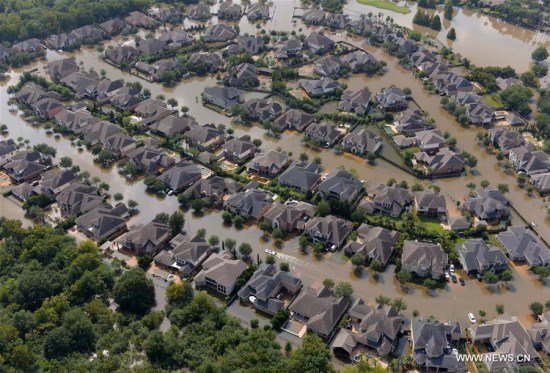 Aerial photo taken on Sept. 1, 2017 shows flooded houses after Hurricane Harvey attacked Houston, Texas, the United States. (Xinhua/Yin Bogu)