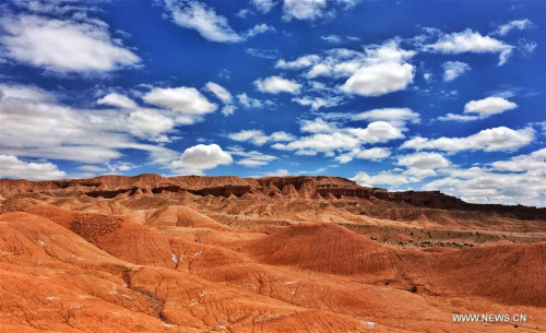 Photo taken on July 24, 2017 shows a view of the red cliff region in Da Qaidam (also known as Dachaidan) district in the Mongolian-Tibetan Autonomous Prefecture of Haixi, northwest China's Qinghai Province. China's first Mars simulation base will be established here according to the local government. (Xinhua/Zhang Qingzhe)