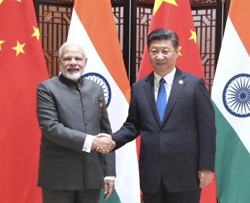 Chinese President Xi Jinping meets with Indian Prime Minister Narendra Modi in Xiamen, southeast China's Fujian Province, Sept. 5, 2017. Modi came to Xiamen to attend the ninth BRICS summit and the Dialogue of Emerging Market and Developing Countries. (Xinhua/Ma Zhancheng)