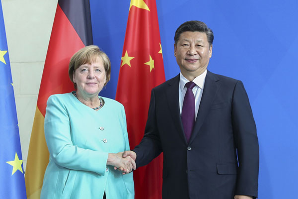 Chinese President Xi Jinping (R) holds talks with German Chancellor Angela Merkel in Berlin, July 5, 2017. (Photo/Xinhua)