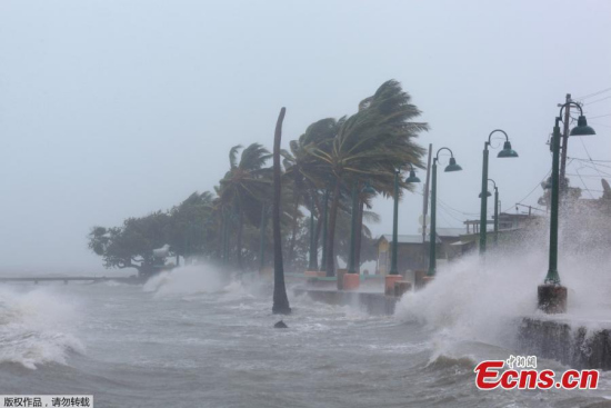 Police patrol the area as Hurricane Irma slams across islands in the northern Caribbean on Wednesday, in San Juan, Puerto Rico, Sept. 6, 2017. (Photo/Agencies)