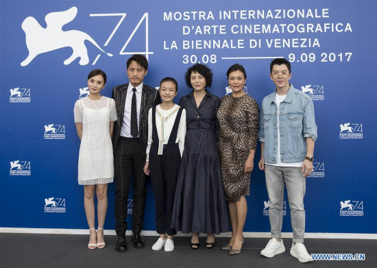 Actress Peng Jing, actor Geng Le, actress Zhou Meijun, Director Vivian Qu, actress Shi Ke and actor Wang Yuexin (L-R) pose during a photocall for the movie Angels wear white at the 74th Venice Film Festival in Venice, Italy, Sept. 7, 2017. (Xinhua/Jin Yu)