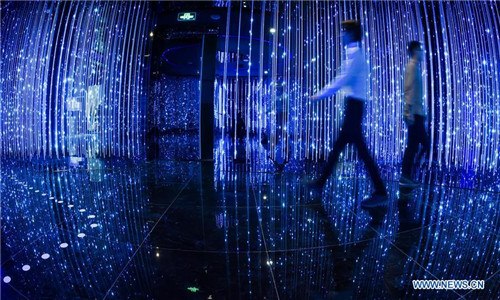 taff workers are seen at a big data demonstration center of Guizhou Shuanglong Airport Economic Zone in southwest China's Guizhou Province, May 16, 2017. The 2017 China international big data industry expo will be held in Guiyang at the end of May. (Xinhua/Ou Dongqu)