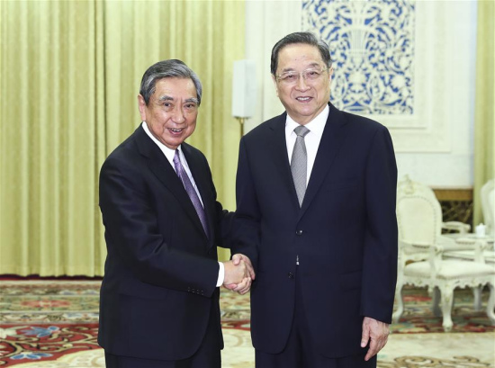 Yu Zhengsheng (R), chairman of the National Committee of the Chinese People's Political Consultative Conference, shakes hands with Yohei Kono, former speaker of the Japanese House of Representatives and current president of the Japanese Association for the Promotion of International Trade, in Beijing, capital of China, Sept. 8, 2017. (Xinhua/Xie Huanchi)
