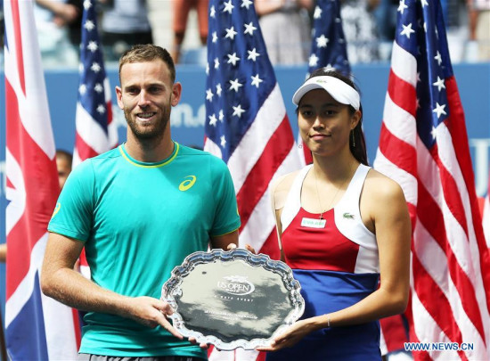 Hao-Ching Chan (R) of Chinese Taipei and Michael Venus of New Zealand attend the awarding ceremony after their mixed doubles final match against Martina Hingis of Switzerland and Jamie Murray of Great Britain at the 2017 U.S. Open in New York, the United States, Sept. 9, 2017. Martina Hingis and Jamie Murray won 2-1 to claim the title. (Xinhua/Qin Lang)