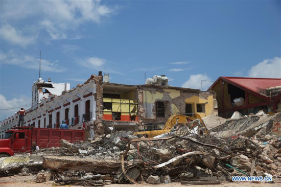 A building collapse site is seen after an earthquake hit in Juchitan, Oaxaca state, Mexico, Sept. 9, 2017. (Xinhua/Dan Hang)