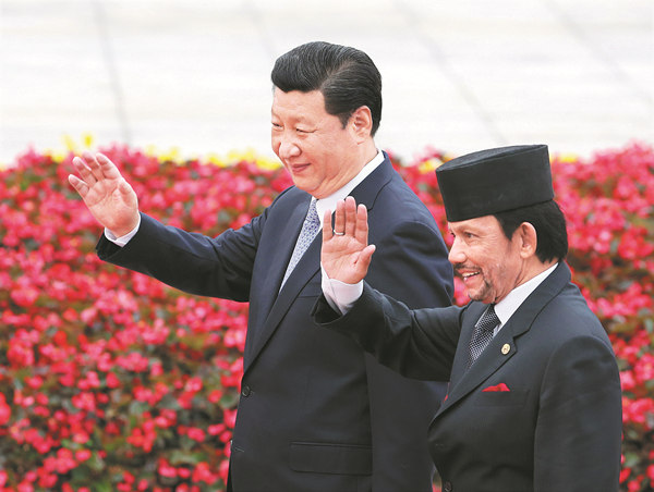 President Xi Jinping holds a welcoming ceremony for Brunei's Sultan Haji Hassanal Bolkiah in Beijing on Wednesday. WU ZHIYI / CHINA DAILY