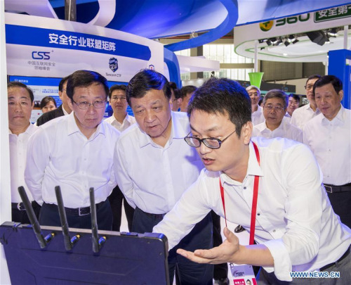 Liu Yunshan, a member of the Standing Committee of the Political Bureau of the Communist Party of China (CPC) Central Committee, also deputy head of the central Internet security and informatization leading group, visits a cybersecurity expo in east China's Shanghai, Sept. 16, 2017. Liu addressed an opening ceremony of a publicity week on Internet security in Shanghai on Saturday. (Xinhua/Li Xueren)