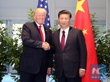 File photo: Chinese President XiJinping (R) meets with his U.S. counterpart Donald Trump to discuss bilateral ties and global hot-spot issues on the sidelines of a Group of 20 (G20) summit, in Hamburg,Germany, July 8, 2017. (Xinhua/Yao Dawei)