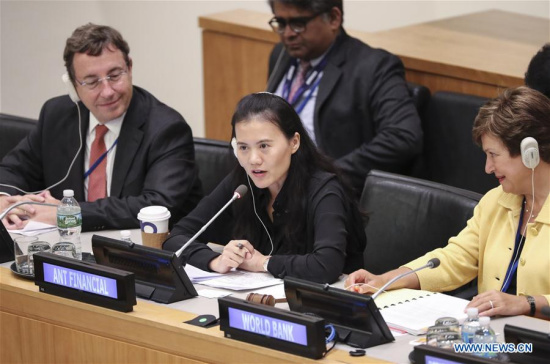 Lucy Peng (C), the executive chair of Ant Financial, an affiliate of China's e-commerce giant Alibaba Group, speaks at a meeting on The Role of the United Nations in regard to financing the 2030 Agenda at the UN headquarters in New York, Sept. 18, 2017. (Xinhua/Wang Ying)