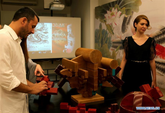 People visit the exhibition Ancient Chinese Science and Technology held at Herakleidon Museum in Athens, Greece on Sept. 21, 2017. (Xinhua/Marios Lolos)