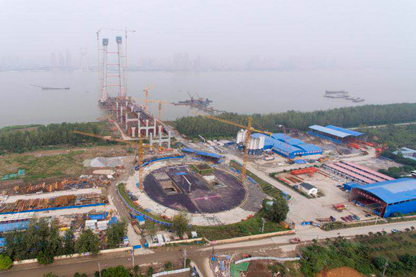 The Yangsigang Yangtze River Bridge is under construction. (Photo provided to chinadaily.com.cn)