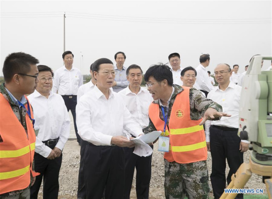Chinese Vice Premier Zhang Gaoli inspects in the Xiongan New Area, a landmark new economic zone near Beijing, in north China's Hebei Province, Sept. 26, 2017. (Xinhua/Wang Ye)
