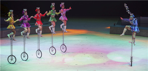 Other acrobatic performances include playing with bowls by a troupe from Inner Mongolia. (Photo by Wang Zhuangfei/China Daily)