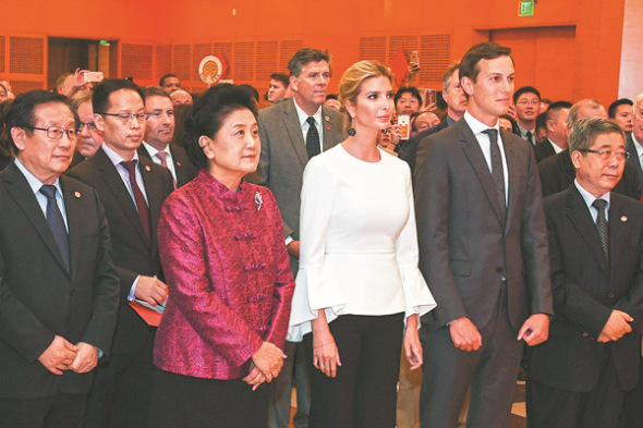 Vice Premier Liu Yandong (left center) stands with Ivanka Trump, daughter of U.S. President Donald Trump, and her husband Jared Kushner, the senior White House adviser, at the Chinese embassy in Washington on Wednesday.(Photo: Xinhua/Yin Bogu)