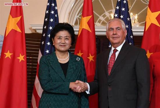 Chinese Vice Premier Liu Yandong shakes hands with U.S. Secretary of State Rex Tillerson at the U.S. Department of State in Washington D.C. Sept. 28, 2017. The first China-U.S. Social and People-to-People Dialogue was held on Thursday in Washington. The event was co-chaired by Liu Yandong and Rex Tillerson. (Xinhua/Yin Bogu)