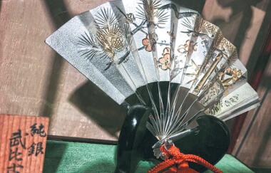 A silver-boned folding fan on sale in the shop. Liang Fengxin/China Daily A silver-boned folding fan on sale in the shop. Liang Fengxin/China Daily