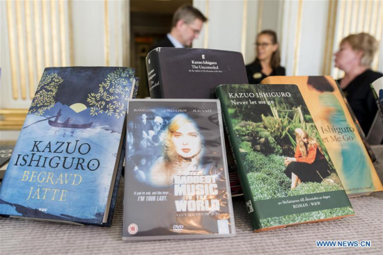 Photo taken on Oct. 5, 2017 shows some literary works of Kazuo Ishiguro, the winner of the Nobel Prize in Literature 2017, in Stockholm, Sweden. The Nobel Prize in Literature for 2017 was awarded to Kazuo Ishiguro who, in novels of great emotional force, has uncovered the abyss beneath our illusory sense of connection with the world, the Swedish Academy announced in Stockholm on Thursday. (Xinhua/Shi Tiancheng)