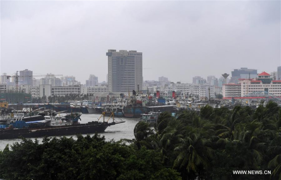 Fishing boats dock at a port of Haikou, south China's Hainan Province, Oct. 15, 2017. This year's 20th typhoon, Khanun, is expected to make landfall between Zhanjiang of Guangdong province and Wenchang of Hainan province, bringing rough gales and heavy storms. (Xinhua/Yang Guanyu) 