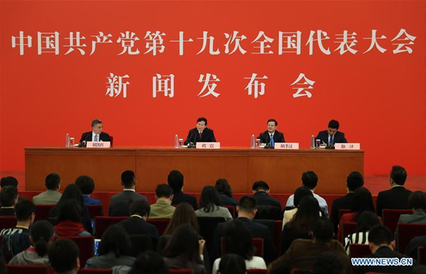 Tuo Zhen (2nd L, rear), spokesperson for the 19th National Congress of the Communist Party of China, holds a press conference at the Great Hall of the People in Beijing, capital of China, Oct. 17, 2017. (Xinhua/Yin Gang)