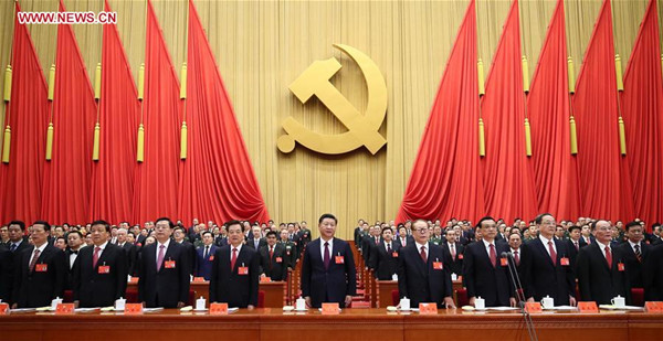 Xi Jinping (C, front), Li Keqiang (3rd R, front), Zhang Dejiang (3rd L, front), Yu Zhengsheng (2nd R, front), Liu Yunshan (2nd L, front), Wang Qishan (1st R, front), Zhang Gaoli (1st L, front), Jiang Zemin (4th R, front) and Hu Jintao (4th L, front) attend the opening session of the 19th National Congress of the Communist Party of China (CPC) at the Great Hall of the People in Beijing, capital of China, Oct. 18, 2017. (Xinhua/Lan Hongguang)
