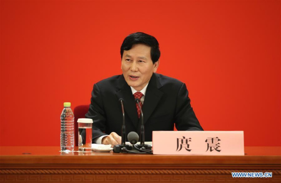 Tuo Zhen, spokesperson for the 19th National Congress of the Communist Party of China, holds a press conference at the Great Hall of the People in Beijing, capital of China, Oct. 17, 2017. (Xinhua/Jin Liwang) 