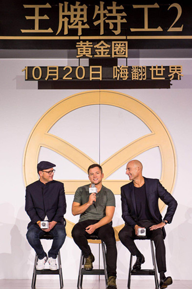 Director Matthew Vaughn (left), actors Taron Egerton (center) and Mark Strong unravel behind-the-scenes stories at a Shanghai promotional event. (Photo provided to China Daily)