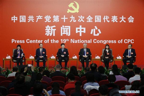 The press center of the 19th National Congress of the Communist Party of China (CPC) holds a group interview on implementing the strategy of innovation-driven development in Beijing, capital of China, Oct. 20, 2017. Wang Zhigang (3rd R), Vice Minister of Science and Technology and secretary of the leading Party group within the ministry, Wang Xiujie (2nd R), director of the Center of Molecular Systems Biology of the Institute of Genetics and Developmental Biology (IGDB) of the Chinese Academy of Sciences (CAS), Wang Endong (3rd L), chief scientist of the Inspur Group and an academician of the Chinese Academy of Engineering, Lu Jianjun (1st R), secretary of the Working Committee on Science and Technology of the CPC Shaanxi Provincial Committee and head of the Shaanxi Science and Technology Department, and Jiang Fengyi (2nd L), vice president of Nanchang University, received the group interview. (Xinhua/Shen Bohan)