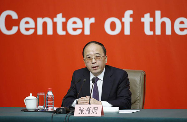 Executive Vice-Minister Zhang Yijiong of the United Front Work Department of the CPC Central Committee speaks during a news conference at the press center of the 19th National Congress of the Communist Party of China in Beijing, Oct 21, 2017. (Photo/Xinhua)