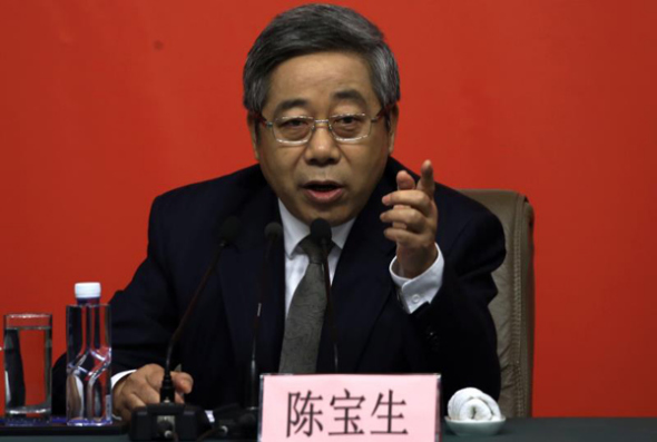 Chen Baosheng, minister of education, speaks at a news conference on the sidelines of the 19th National Congress of the Communist Party of China.(Photo by Edmond Tang/China Daily)