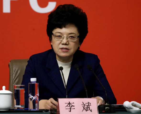 Li Bin, Secretary of the Party Leadership Group and Minister of the National Health and Family Planning Commission, answers questions from the press in Beijing on Oct 22, 2017. (Photo by Edmond Tang/China Daily)