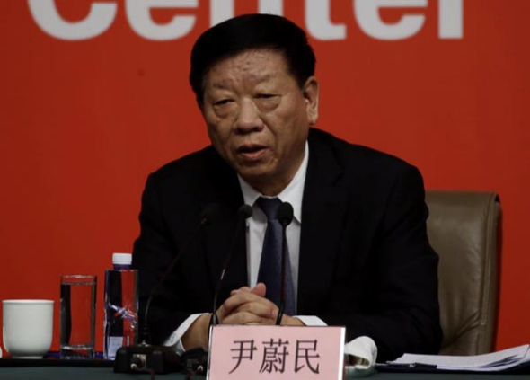 Yin Weimin, minister of Human Resources and Social Security, speaks at a news conference of the 19th National Congress of the Communist Party of China in Beijing, Oct 22, 2017. (Photo by Edmond Tang/China Daily)