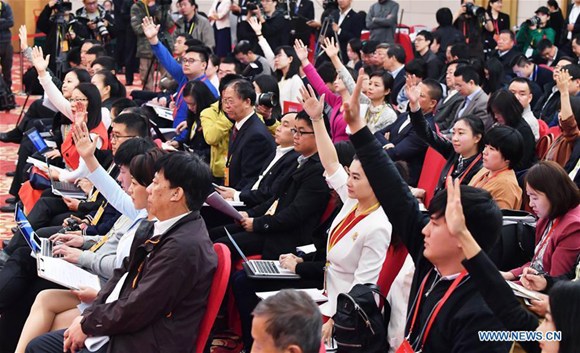 Journalists are seen at a press conference held by the press center of the 19th National Congress of the Communist Party of China (CPC) in Beijing, capital of China, Oct. 22, 2017.  (Xinhua/Li Xin)
