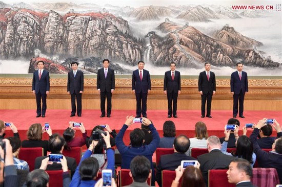 Xi Jinping(C), general secretary of the Central Committee of the Communist Party of China (CPC), and the other newly-elected members of the Standing Committee of the Political Bureau of the 19th CPC Central Committee Li Keqiang (3rd R), Li Zhanshu (3rd L), Wang Yang (2nd R), Wang Huning (2nd L), Zhao Leji (1st R) and Han Zheng, meet the press at the Great Hall of the People in Beijing, capital of China, Oct. 25, 2017. (Xinhua/Li Tao)