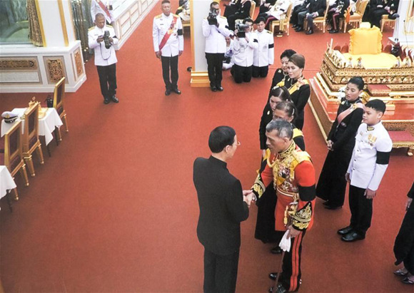 Chinese Vice Premier Zhang Gaoli attended the royal cremation ceremony of Thailand's late King Bhumibol Adulyadej here on Thursday as the special envoy of Chinese President Xi Jinping. During the ceremony, Zhang expressed to Thai King Maha Vajiralongkorn the Chinese side's deep condolences and reverence to the late king and conveyed President Xi's best wishes to King Vajiralongkorn. On behalf of President Xi, Zhang invited King Vajiralongkorn to visit China at an early date after his coronation. King Vajiralongkorn appreciated Zhang's attendance of the cremation ceremony as President Xi's special envoy, saying that he has visited China for several times and he would like to visit China again in the future. King Bhumibol, who had reigned Thailand for 70 years since 1946, was the longest reigning monarch in the world. He died last October after he had been hospitalized for several years. He was succeeded by his only son King Maha Vajiralongkorn, who was named crown prince in 1972.