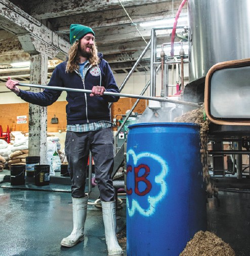Steve Luke, owner of Cloudburst Brewing in Seattle, Washington, works at his brewery. He will be among the beer makers to join the Beijing festival. (Photo provided to China Daily)