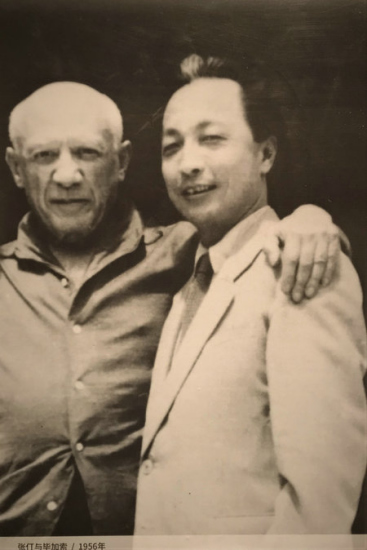 Zhang Ding and Picasso in Cannes, France, in 1956. [Photo provided to China Daily]