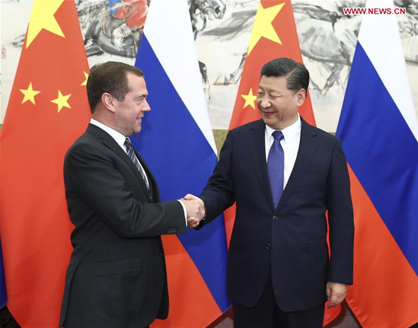 Chinese President Xi Jinping (R) meets with Russian Prime Minister Dmitry Medvedev in Beijing, capital of China, Nov. 1, 2017. (Xinhua/Xie Huanchi)