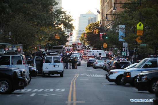 Police vehicles and ambulances are seen near the site of an attack in lower Manhattan in New York, the United States, on Oct. 31, 2017. (Xinhua/Wang Ying)