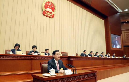 Zhang Dejiang (front), chairman of the National People's Congress (NPC) Standing Committee, presents a report on the implementation of the Solid Waste Control Law to the NPC Standing Committee at its six-day bimonthly session in Beijing, capital of China, Nov. 1, 2017. (Xinhua/Liu Weibing)