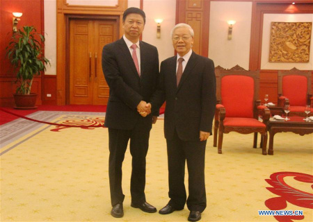 General Secretary of the Communist Party of Vietnam Nguyen Phu Trong (R) meets with Song Tao, special envoy of General Secretary of the Communist Party of China (CPC) Central Committee Xi Jinping, in Hanoi, Vietnam, Nov. 1, 2017. (Xinhua/Le Yanna)