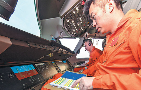 Pilots prepare for the third test flight of the home-developed C919 on Friday in Shanghai. (Photo provided to China Daily)