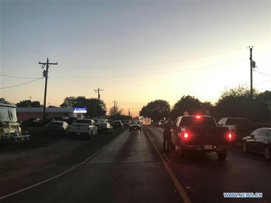 A road near the attack site is blocked by police in Sutherland Springs of Texas, the United States, Nov. 5, 2017. (Xinhua/Liu Liwei)