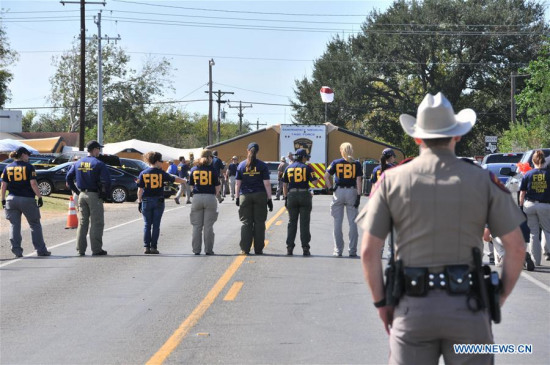 FBI agents search for evidence near the church where a mass shooting occurred in Sutherland Springs, Texas, the United States, Nov. 6, 2017. (Xinhua/Liu Liwei)