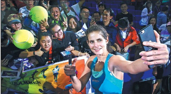 Champion Julia Goerges laps up the attention at the WTA Elite Trophy Zhuhai, where fans' enthusiasm and zeal made for an extra-special atmosphere at the WTA event. Photo provided to China Daily