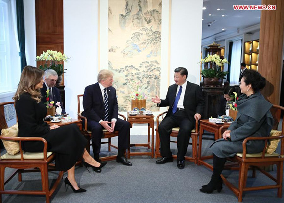 Chinese President Xi Jinping (3rd R) and his wife Peng Liyuan (1st R), and U.S. President Donald Trump (3rd L) and his wife Melania Trump (1st L) have an informal afternoon tea in the Baoyun Building of the Palace Museum in Beijing, capital of China, Nov. 8, 2017. (Xinhua/Lan Hongguang)