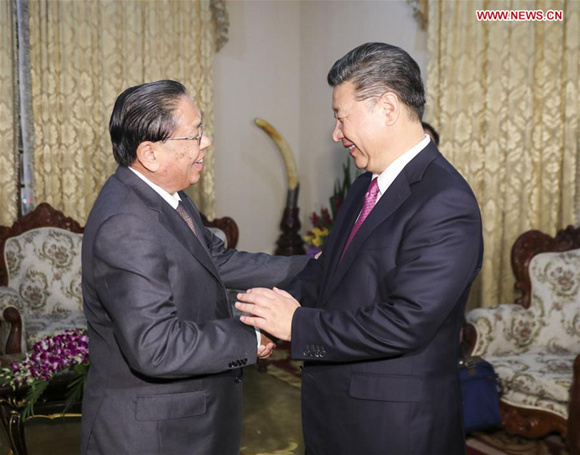 Chinese President Xi Jinping (R), also general secretary of the Communist Party of China Central Committee, meets with former Lao President Choummaly Saygnasone, also former general secretary of the Lao People's Revolutionary Party (LPRP) Central Committee, in Vientiane, Laos, Nov. 13, 2017. (Xinhua/Ding Lin)